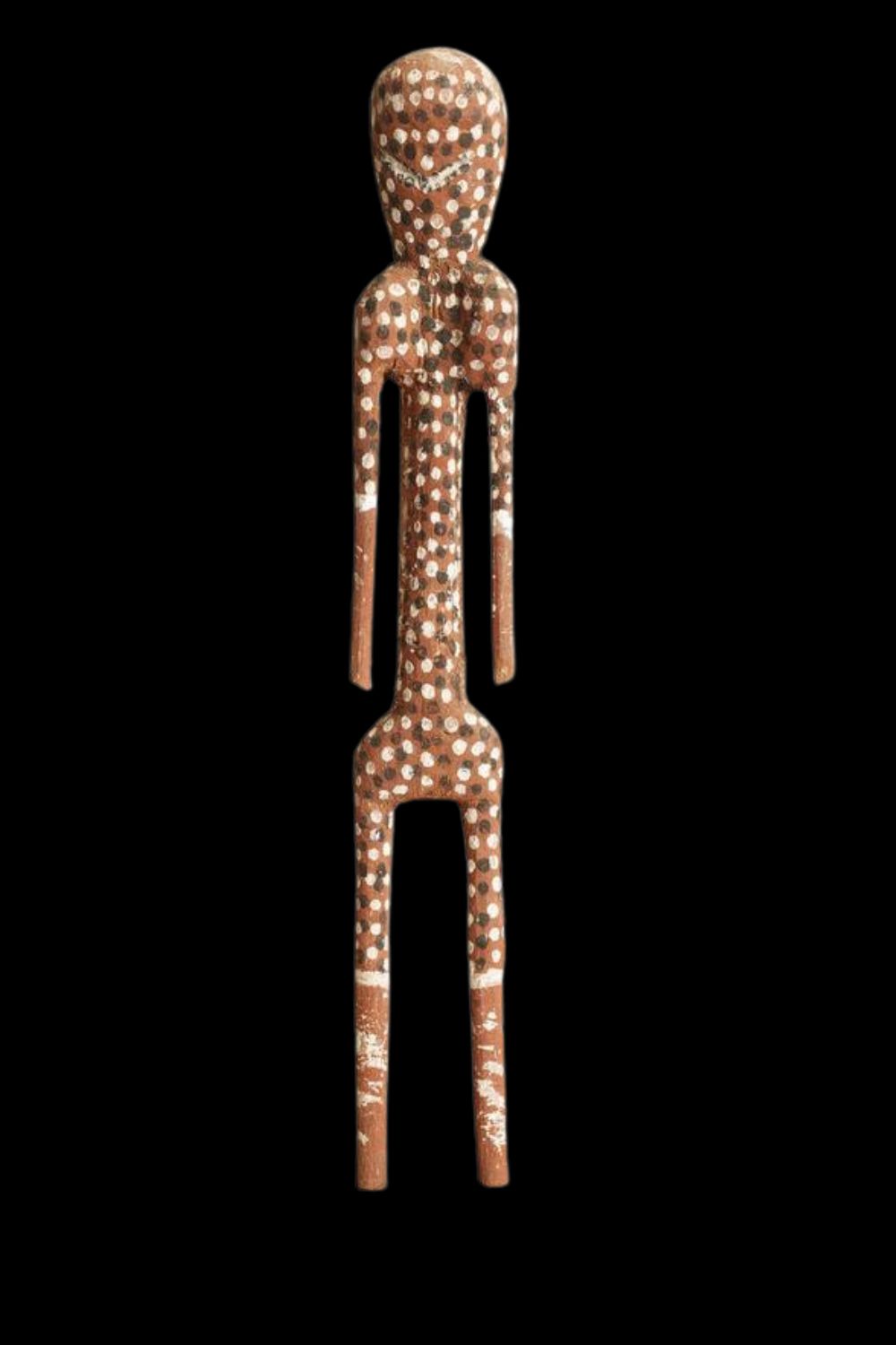 Early Crusoe Kuningbal Mimih spirit sculpture – hand-carved Aboriginal figure from Maningrida, adorned with natural ochres and dot patterns, exemplifying Arnhem Land ceremonial art and early innovation in Aboriginal sculpture.