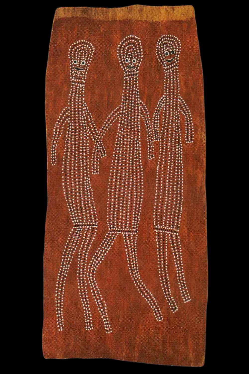 Crusoe Kuningbal bark painting of three Mimih spirits – iconic Aboriginal artwork from Arnhem Land featuring elongated dotted figures on red ochre ground, representing ancestral spirit beings with dynamic movement and ceremonial symbolism.