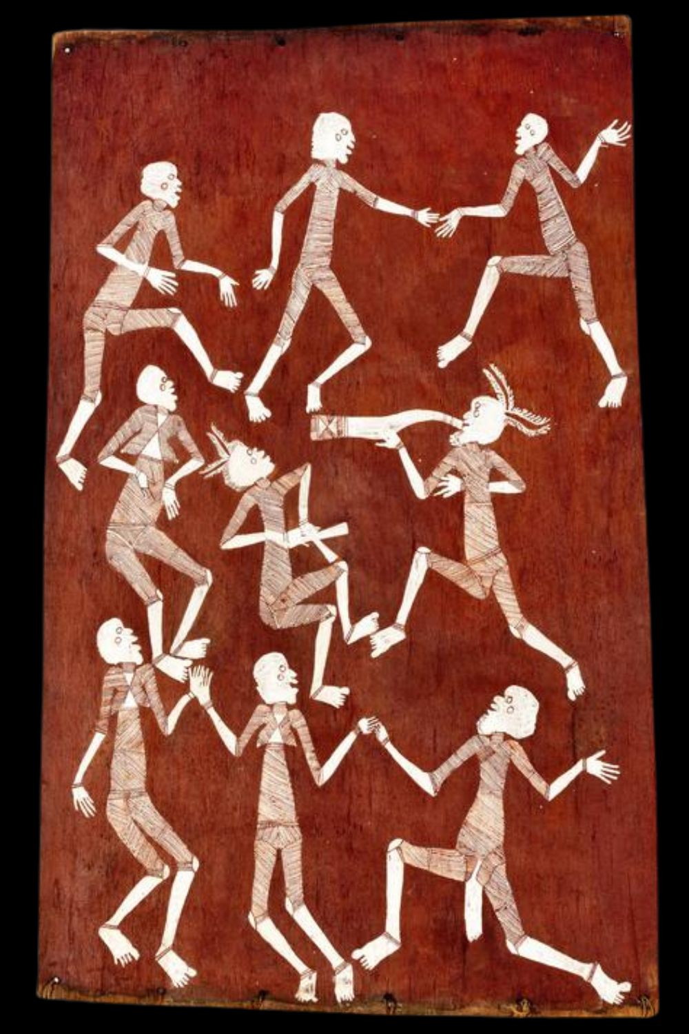 Lofty Bardayal Nadjamerrek bark painting depicting ceremonial dance, featuring multiple white ochre figures with rarrk body designs on red earth background, capturing dynamic movement, ancestral tradition, and Kuninjku cultural storytelling from Western Arnhem Land