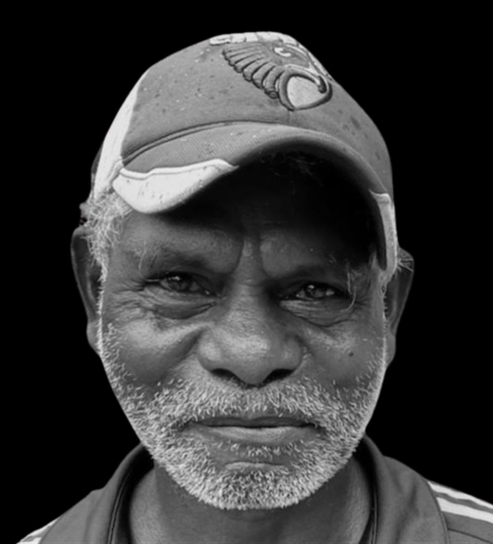 Black and white photo of Declan Apuatimi