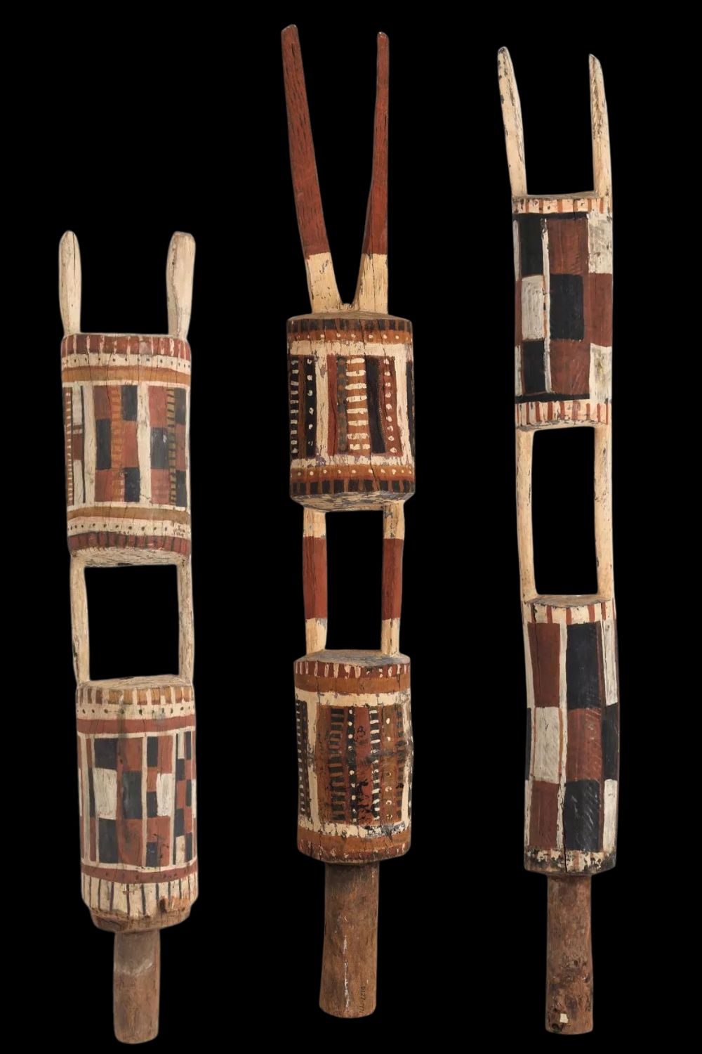 carved and painted Pukumani Poles by Mani Luki Wommatakimmi