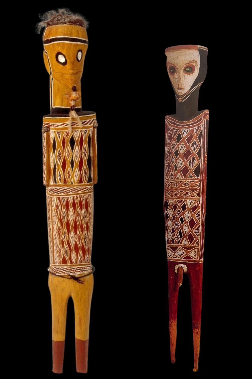 Two aboriginal sculptures depicting Laindjung carved and painted by Birrikidji Gumana