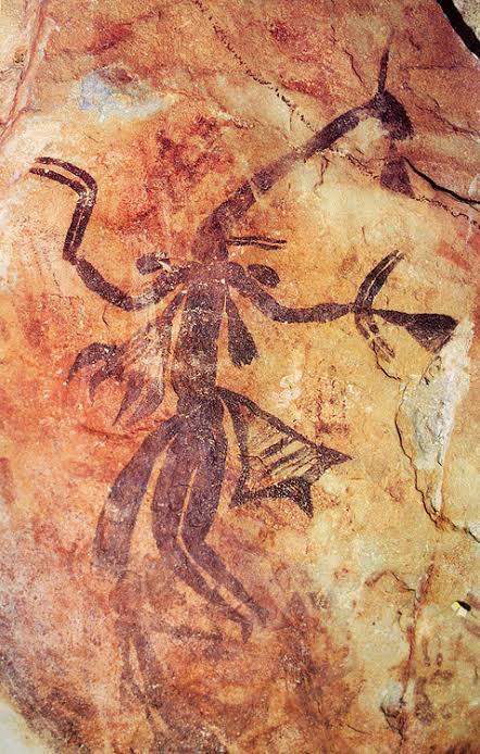 Yowna-bradshaw holding boomerangs used in Antique aboriginal boomerang article