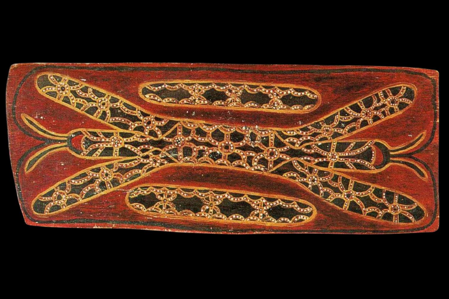 Abstract ceremonial bark painting by Charlie Mardigan featuring sacred symbolic forms and ochre geometric patterning from the Port Keats tradition