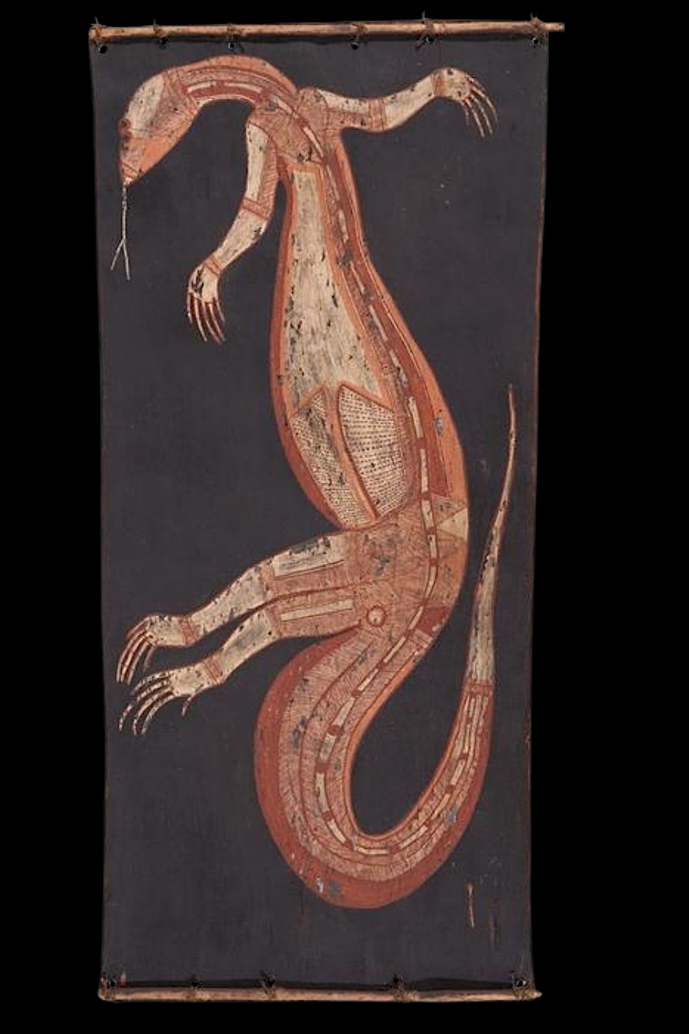 Aboriginal bark painting of a perentie lizard (Ngiṉṯaka) from Arnhem Land painted in natural ochres by Lofty Nadjamerrek