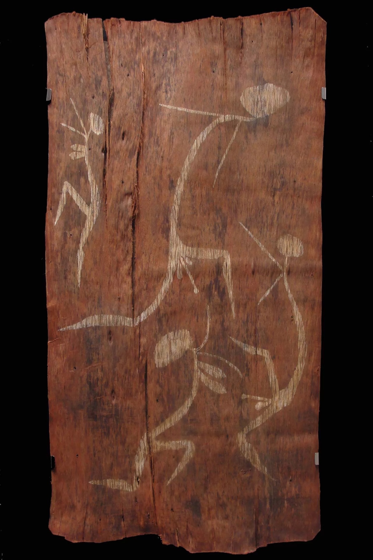 Early Arnhem Land bark painting depicting elongated Mimih spirit figures from Western Arnhem Land Aboriginal art traditions.