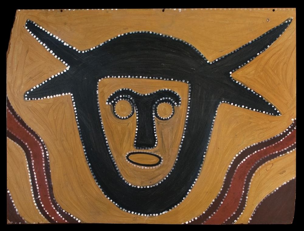 Ochre painting by Paddy Jaminji depicting a devil-devil spirit figure in the early East Kimberley painting style.