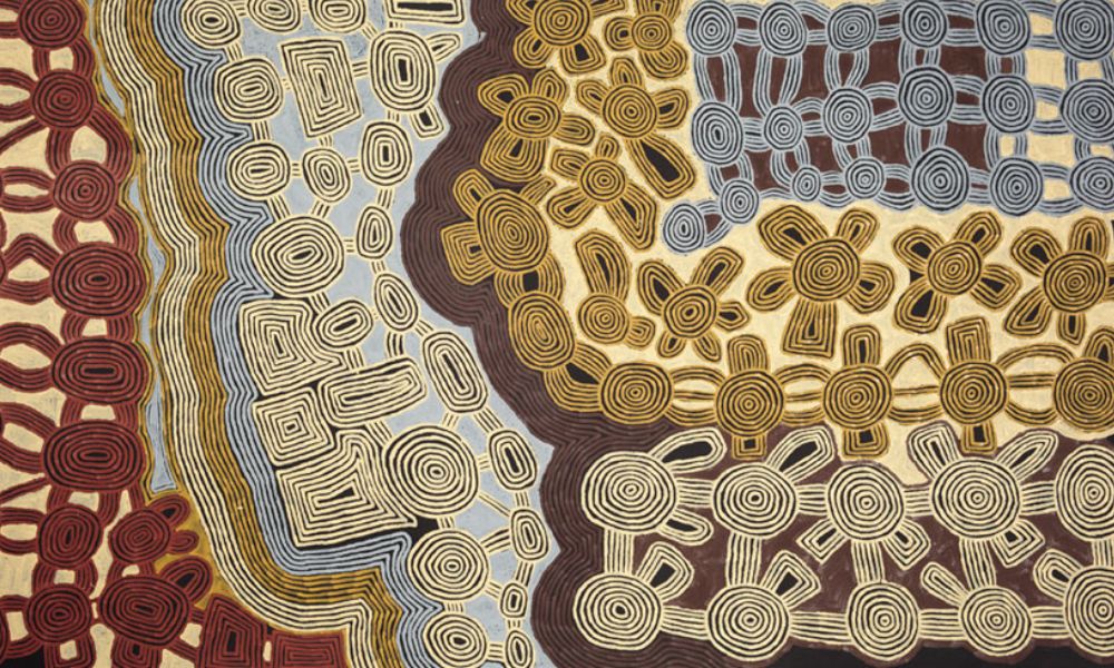 Ronnie Tjampitjinpa Pintupi painting with concentric ceremonial forms and Tingari iconography