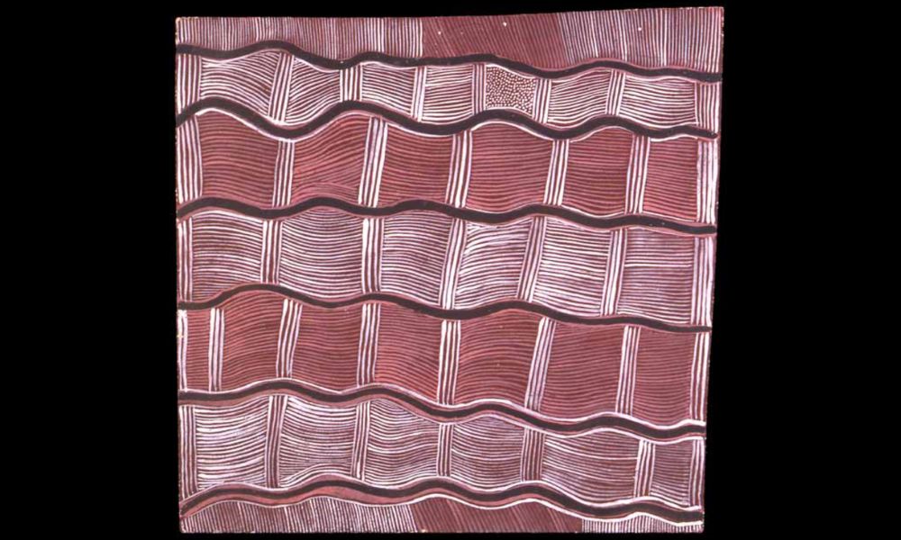 Early Papunya painting by Mick Namarari Tjapaltjarri featuring flowing parallel linework and rhythmic ceremonial structures associated with Western Desert Art