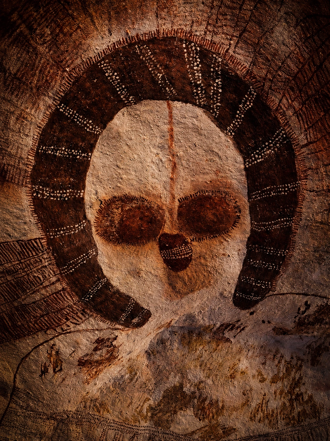 Ancient Wandjina spirit figure painted on a Kimberley rock shelter in Western Australia