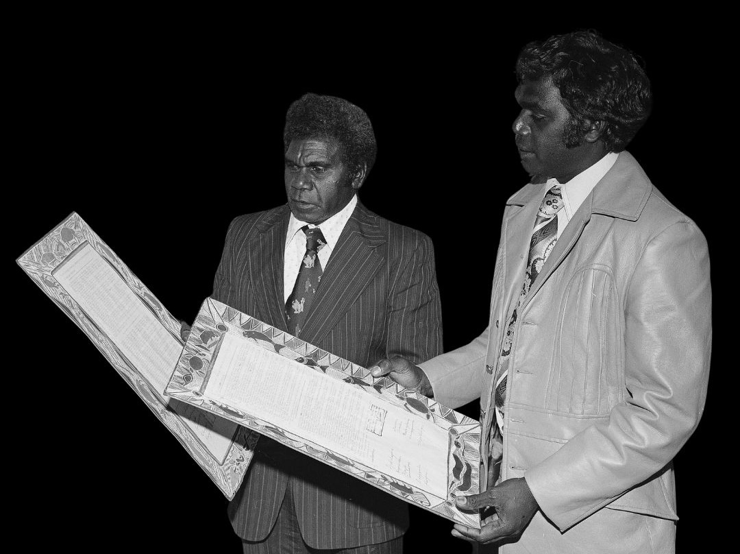 Yolngu leaders holding the Yirrkala Bark Petitions, historic Aboriginal land rights documents from North East Arnhem Lan