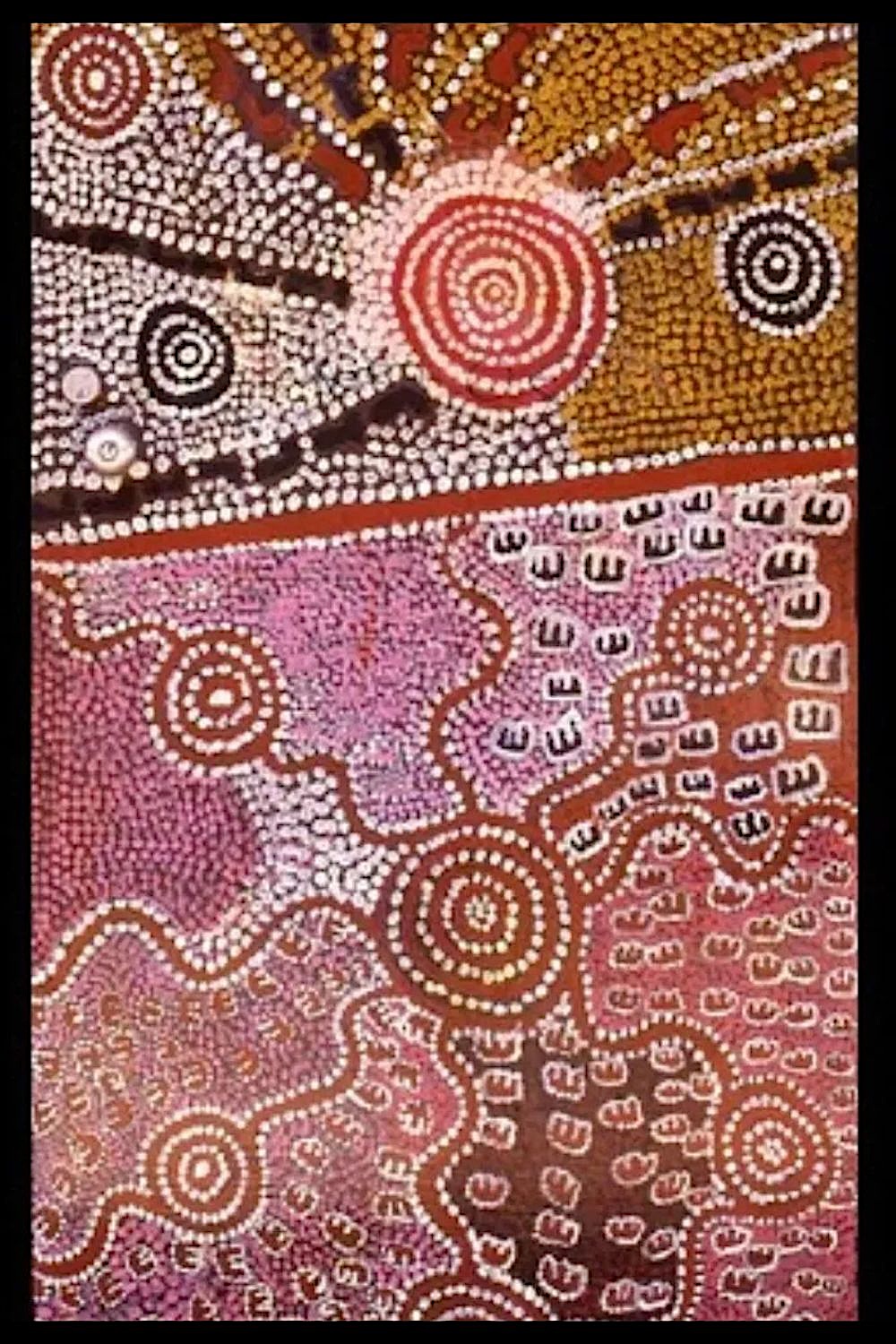 Warlpiri Aboriginal painting featuring concentric circles, travelling lines, and ceremonial symbols representing ancestral journeys across Central Australian Country