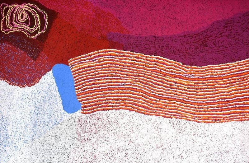 Irika (2015) by Tommy Watson, acrylic on canvas with sweeping white and ochre dotted bands across rich crimson and purple fields representing the ancestral landscape of Irika.