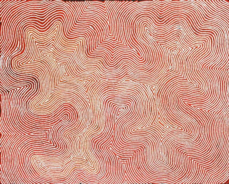 Tingari by Warlimpirrnga Tjapaltjarri, 2006. An abstract Aboriginal painting filled with thousands of fine cream and pale ochre dotted lines flowing across a rich red-ochre background. The lines weave continuously through sweeping curves, rounded forms, sharp zigzags and angular turns, creating a complex maze-like pattern with no empty spaces. The warm red, cream and soft ochre colours produce a shimmering optical effect that suggests shifting desert sandhills viewed from above.