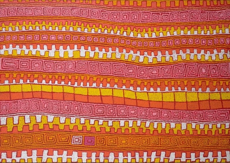 A wide horizontal Aboriginal painting in glowing shades of burnt orange, terracotta, golden yellow, cream, white and soft magenta. Broad horizontal bands sweep gently across the canvas, each decorated with repeating geometric patterns including concentric rectangles, stepped motifs, rows of coloured blocks and finely dotted contour lines. The warm colours alternate rhythmically, while bright white passages and golden yellow bands create striking contrast against the deeper oranges and reds. Thousands of tiny dots form every line and shape, giving the painting a shimmering, woven appearance. The flowing horizontal rhythms resemble parallel sand ridges and ceremonial pathways stretching across the Western Desert when viewed from above.