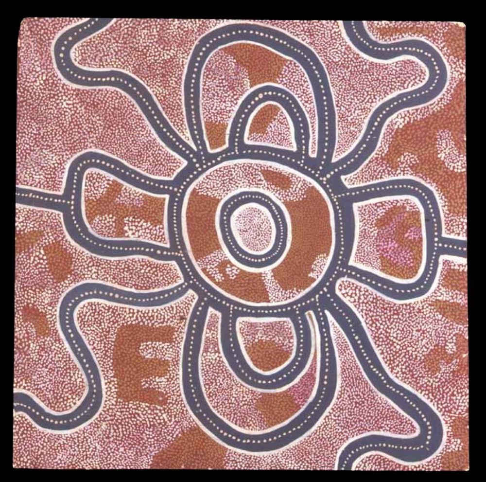 Spider Dreaming Papunya Board painted by David Corby Tjapaltjarri around 1971, featuring concentric circles and Aboriginal dot painting representing the Spider Dreaming in Western Desert Art.