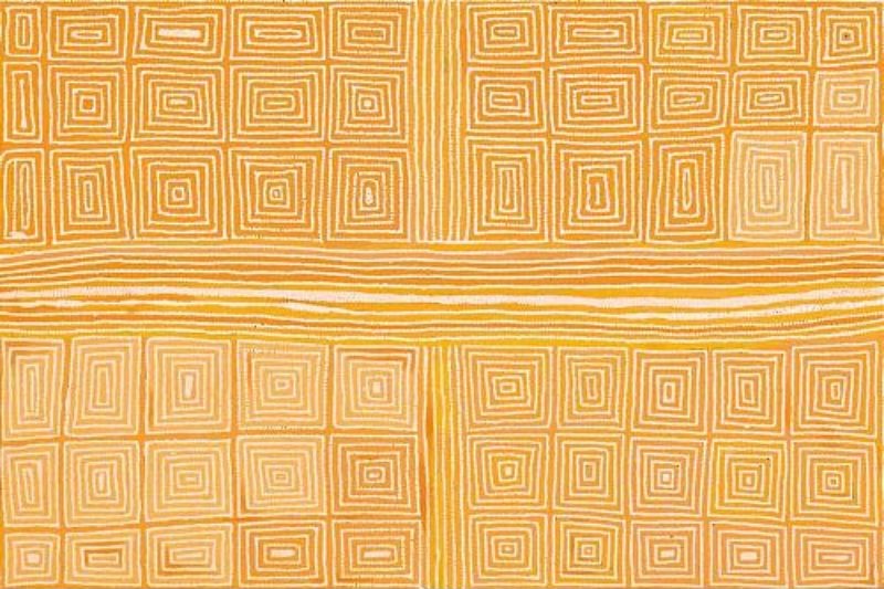 A large horizontal Aboriginal painting in subtle desert colours of pale ochre, golden yellow, cream and soft white. The composition is divided into four rectangular sections filled with neat grids of concentric rectangular shapes that resemble ceremonial designs or enclosed sites viewed from above. A broad horizontal band of closely spaced parallel lines flows across the centre of the painting like a sandy creek bed or travelling route, while a narrower vertical band intersects it, forming a cross that divides the canvas into four quarters. Every line is built from thousands of tiny cream and white dots, creating a delicate shimmering texture despite the highly geometric design. The restrained palette and precise repetition give the painting a calm, meditative quality, evoking an aerial view of an ordered desert landscape.