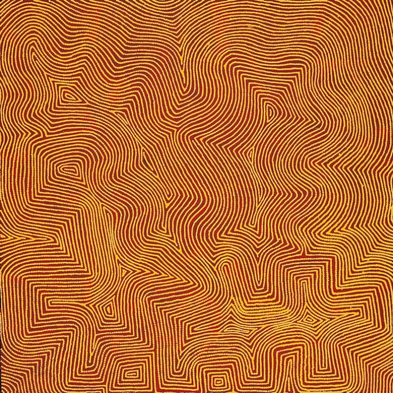 Marawa by Warlimpirrnga Tjapaltjarri, 2005. A square painting in glowing golden ochre, deep crimson and burnt orange. Thousands of tiny ochre dots form broad parallel lines that sweep across the canvas in flowing curves, sharp zigzags and stepped pathways. The warm colours pulse against one another, creating a shimmering optical effect like desert sand glowing beneath the afternoon sun while revealing hidden geometric forms within the landscape.