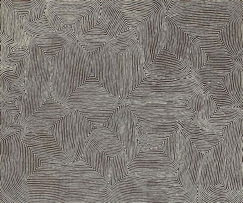 Kalparti by Warlimpirrnga Tjapaltjarri, 2003. A large horizontal painting in black, white and soft grey. Thousands of tiny white dots form tightly packed parallel lines flowing across a dark background. The lines bend into broad stepped pathways, elongated rectangles and angular turns, creating a shimmering maze-like pattern that resembles carved ceremonial designs, desert landforms and ancient pathways seen from above.