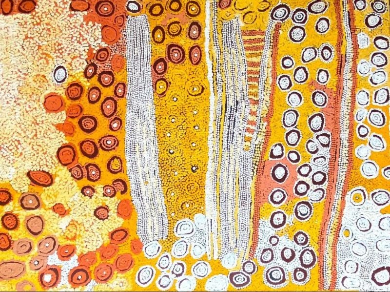 Untitled (2000) by Naata Nungurrayi, acrylic on linen featuring flowing vertical bands, concentric motifs and finely layered dotting in warm ochre, yellow, cream and white.