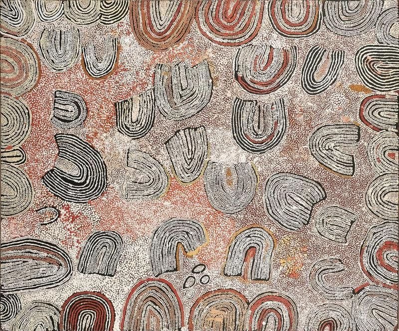 Naata Nungurrayi painting The Rockhole and Soakage Water Site of Marrapinti (2001), depicting sweeping aerial sandhill formations in white, black and muted ochre against a softly dotted cream and pink desert landscape.