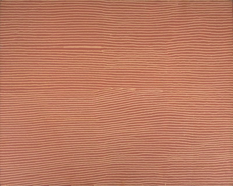 Untitled by Warlimpirrnga Tjapaltjarri, 2002. A wide horizontal painting in soft terracotta, salmon pink and pale cream. Hundreds of fine parallel dotted lines run across the canvas from left to right with only subtle changes in direction, creating a tranquil, shimmering surface. Gentle bends and flowing contours suggest wind passing over desert sand or the rippled surface of a claypan under changing light.