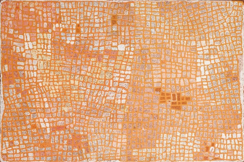Naata Nungurrayi painting Marrapinti (2002), featuring an intricate network of cream dotted ceremonial pathways across a warm ochre ground representing the Marrapinti site in Pintupi Country.
