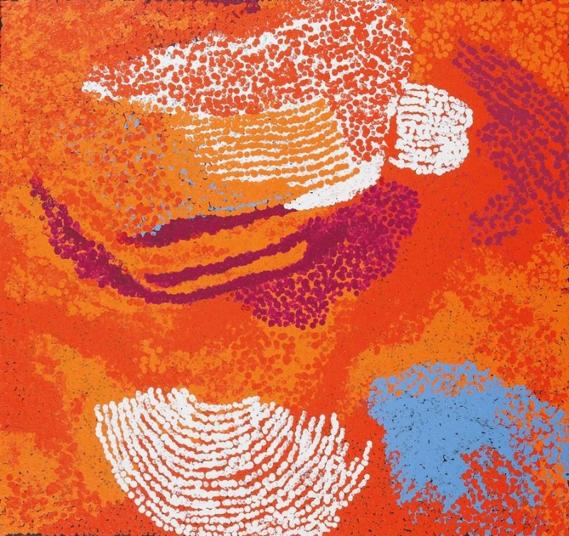 My Country (2016) by Tommy Watson, synthetic polymer paint on linen with brilliant orange, white, crimson and pale blue dotted forms representing the artist's ancestral Pitjantjatjara Country.