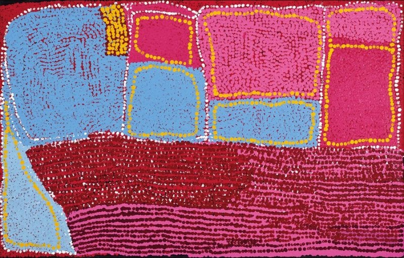 Tjamuku Ngura (2007) by Tommy Watson, synthetic polymer paint on Belgian linen featuring pink, crimson and pale blue geometric forms outlined with yellow and white dots in an abstract representation of ancestral Country.