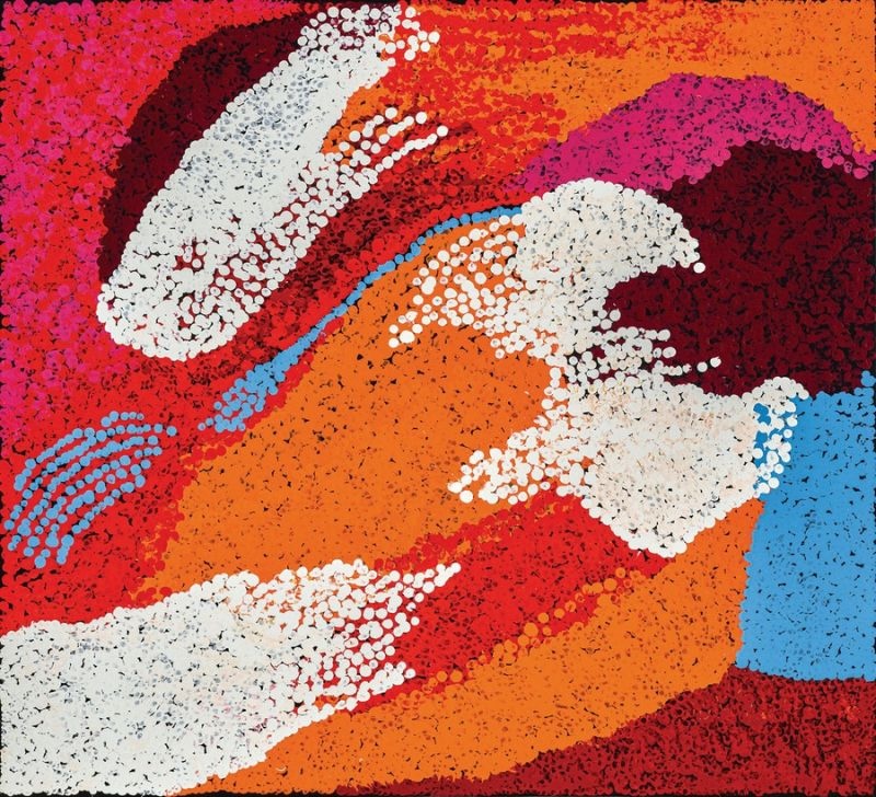 Umutju Rock Hole (2009) by Tommy Watson, synthetic polymer paint on linen featuring bold fields of orange, crimson, magenta, white and blue in an abstract depiction of the Umutju rockhole.