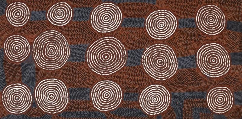 Tingari by Warlimpirrnga Tjapaltjarri, 1993, synthetic polymer paint on Belgian linen depicting concentric ceremonial sites linked by finely dotted pathways in white, brown and black.