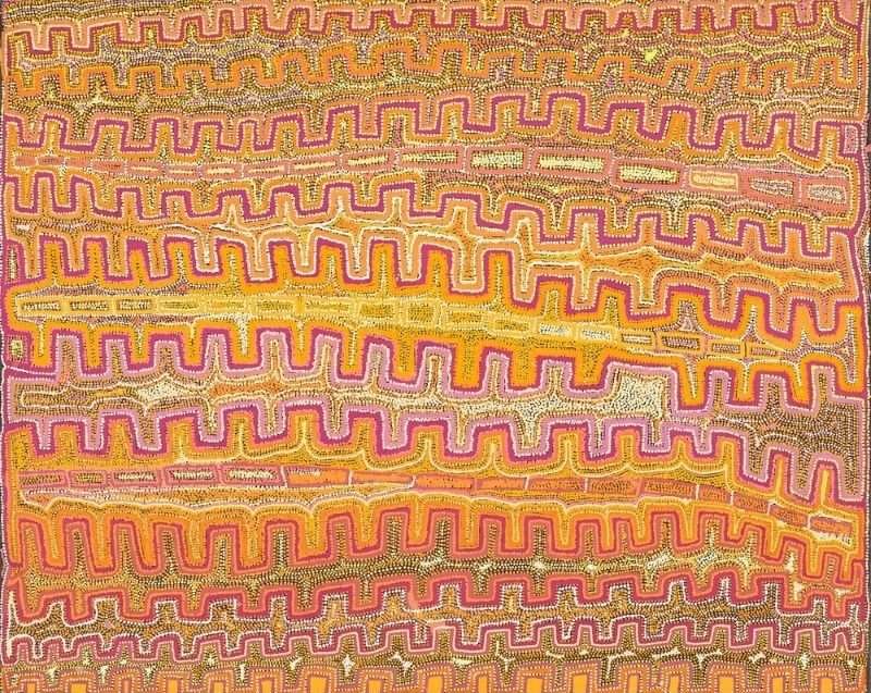 A large vertical Aboriginal painting filled with broad horizontal bands in glowing shades of magenta, burnt orange, golden yellow, ochre, cream and white. Each band is formed from repeating stepped and undulating patterns built from thousands of tiny dots, creating the appearance of parallel sand ridges stretching across the landscape. Several pale cream pathways cut diagonally across the composition, weaving between the coloured bands and suggesting ancestral travel routes. Fine dotted contour lines fill every space, producing a shimmering optical effect as the colours shift between warm oranges, pinks and yellows. The repeated horizontal rhythms create a strong sense of movement and depth, resembling an aerial view of the Western Desert shaped by ceremonial journeys.