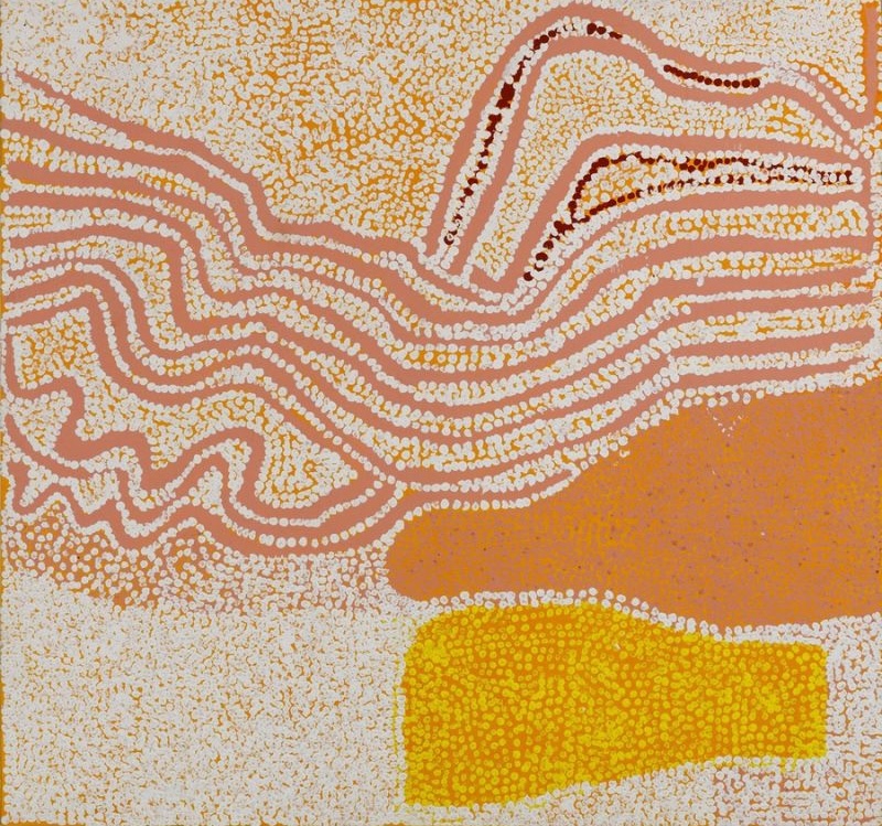 Untitled (2004) by Tommy Watson, synthetic polymer paint on linen featuring flowing cream, ochre and yellow dotted bands across a pale ground in an abstract depiction of Western Desert Country.