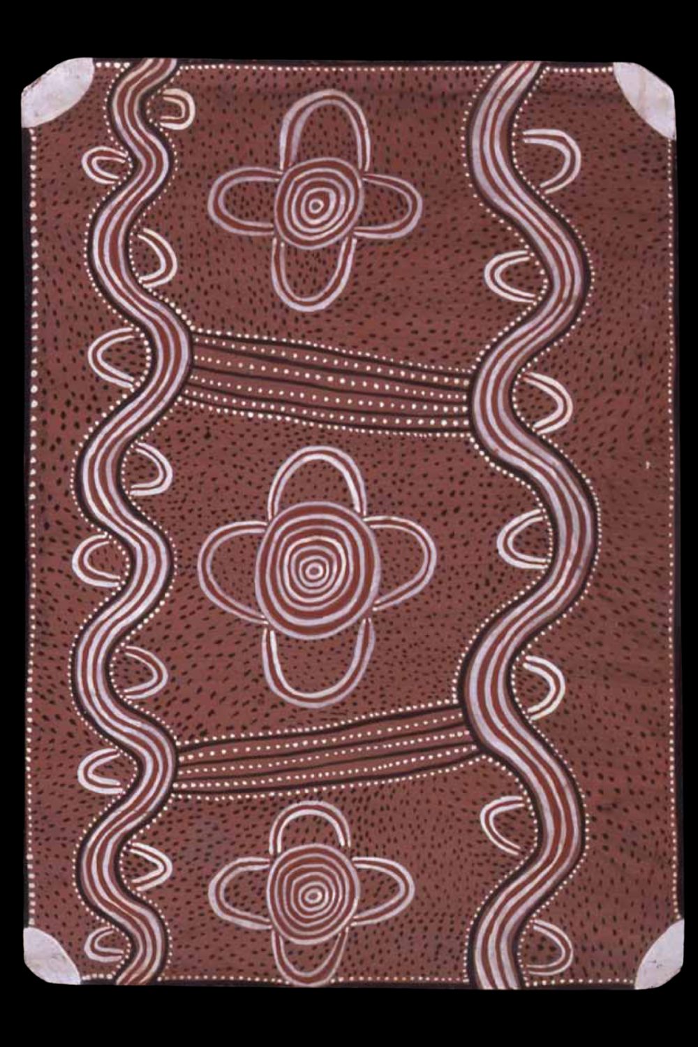 Early Papunya Board by Long Jack Phillipus Tjakamarra depicting ceremonial body painting designs with concentric circles, ancestral pathways and symbolic Western Desert motifs.