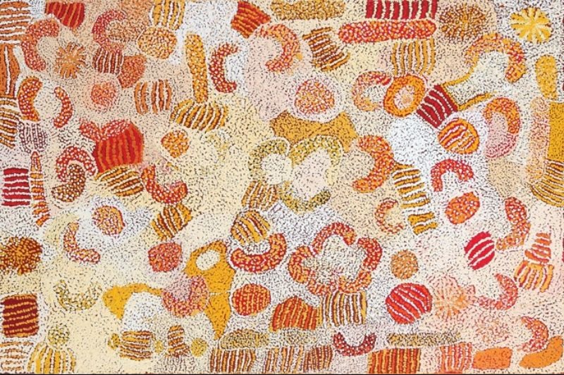 Parwalla (2003) by Elizabeth Nyumi, acrylic on linen in white, cream, pale ochre, yellow, orange, red, pink, burgundy and brown depicting the sandhills, spinifex and bush food Country of Parwalla in the Great Sandy Desert.
