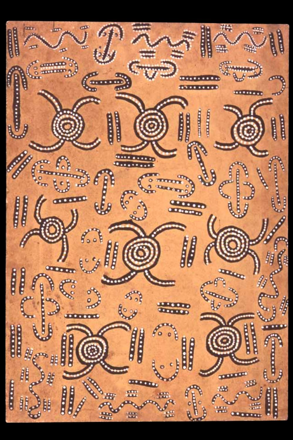 Early Papunya Board attributed to John Tjakamarra depicting the Mala Dreaming Songline with concentric circles, ancestral pathways and symbolic Western Desert Aboriginal dot painting.