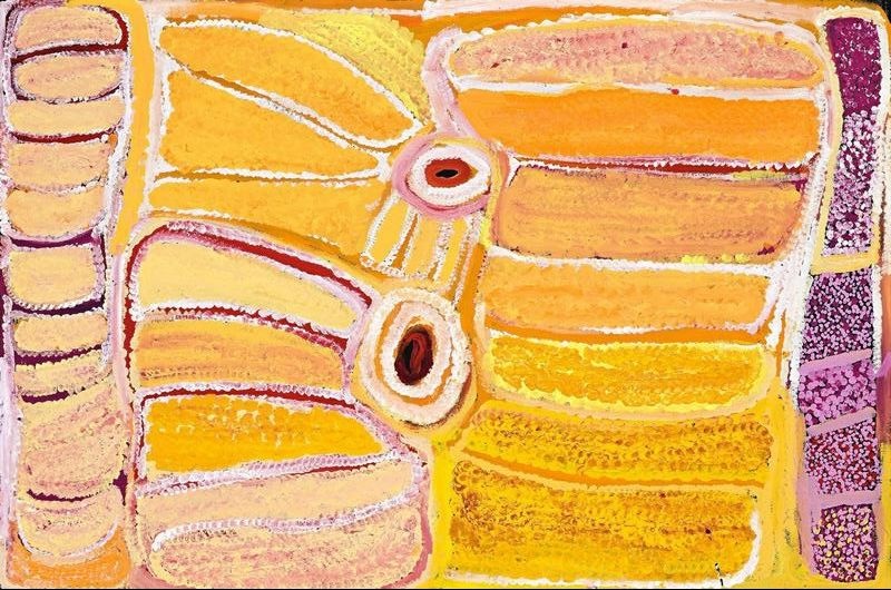 Mindiki Karu by Eubena Nampitjin showing pale yellow, ochre and mauve sandhill forms, two central soakwaters and white dotted contours in the Balgo painting style.
