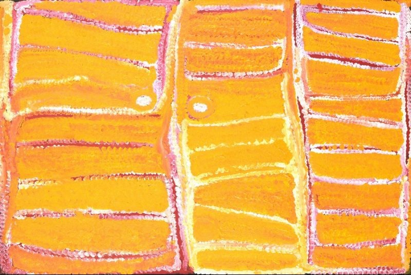 Untitled by Eubena Nampitjin showing luminous yellow and orange parallel sandhills with subtle white and pink dotted contours in the Balgo painting style.