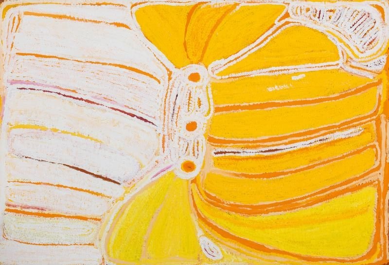 Painting by Eubena Nampitjin showing bright yellow and white sandhill forms surrounding three linked rockholes with white dotted contours in the Balgo style.