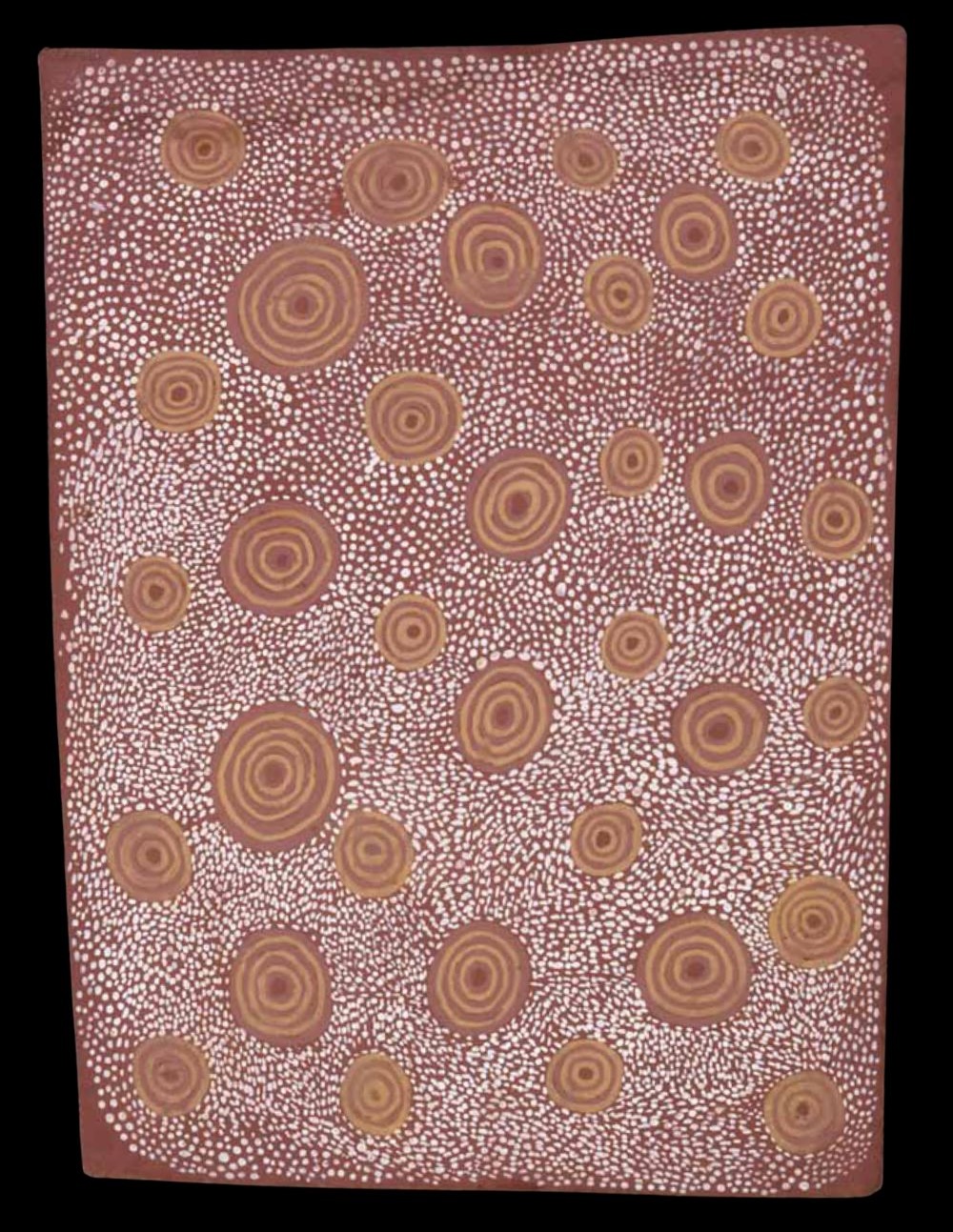 Early Papunya Board attributed to Shorty Lungkata Tjungurrayi showing extensive fields of Aboriginal dot painting surrounding concentric circle symbols representing Country.