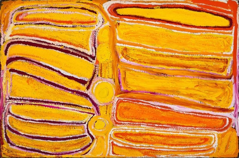 Inyaroo by Eubena Nampitjin showing sweeping yellow, ochre and orange sandhill forms, linked waterholes and white dotted contours in the Balgo style