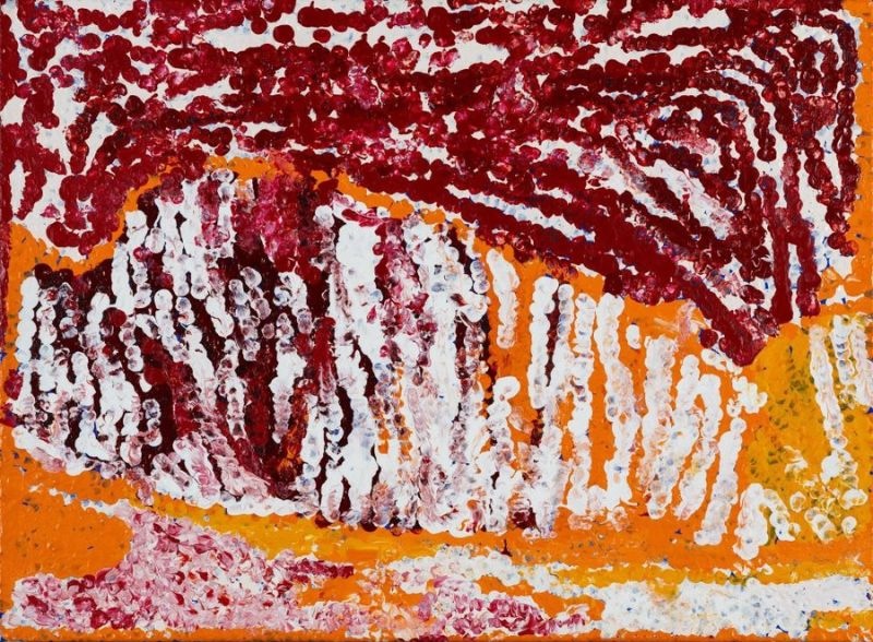 Pukara (2012) by Tommy Watson, acrylic on linen featuring expressive crimson, white and ochre dotted forms in an abstract depiction of Pukara Country.