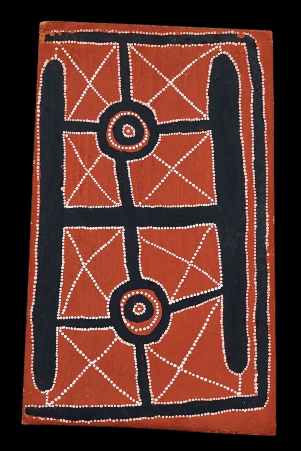 Early Papunya Board painting by Charlie Ward Tjakamarra, c.1972, featuring concentric circles, ceremonial pathways and geometric Western Desert designs.