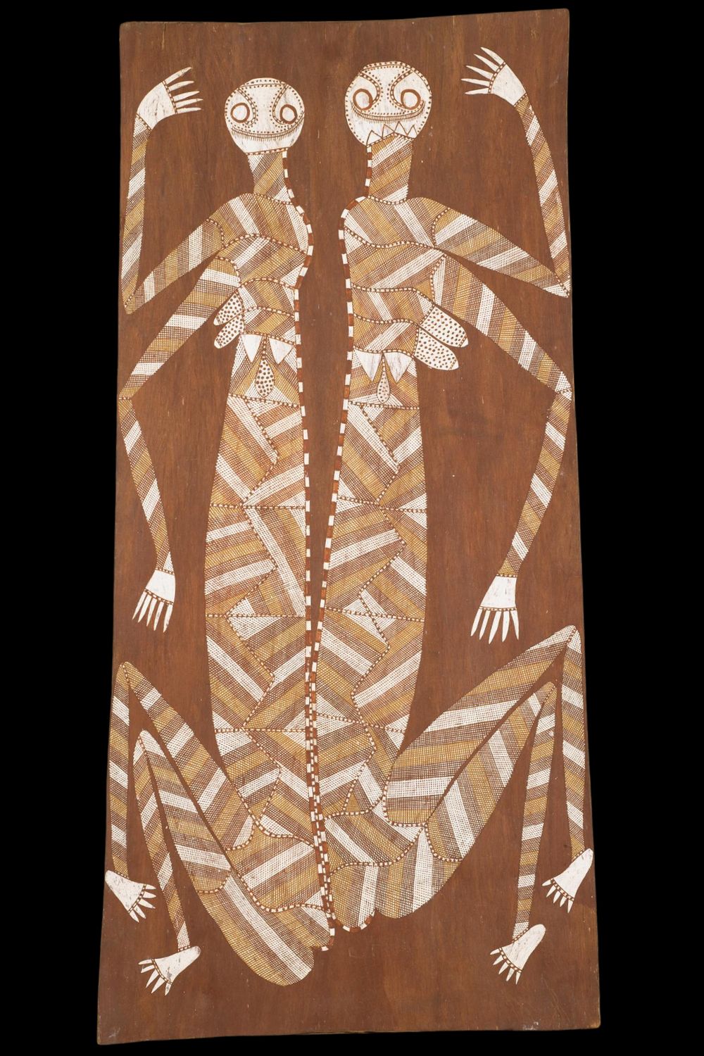 David Milaybuma bark painting depicting two Yawkyawk water spirit women in natural ochres on eucalyptus bark, Western Arnhem Land.