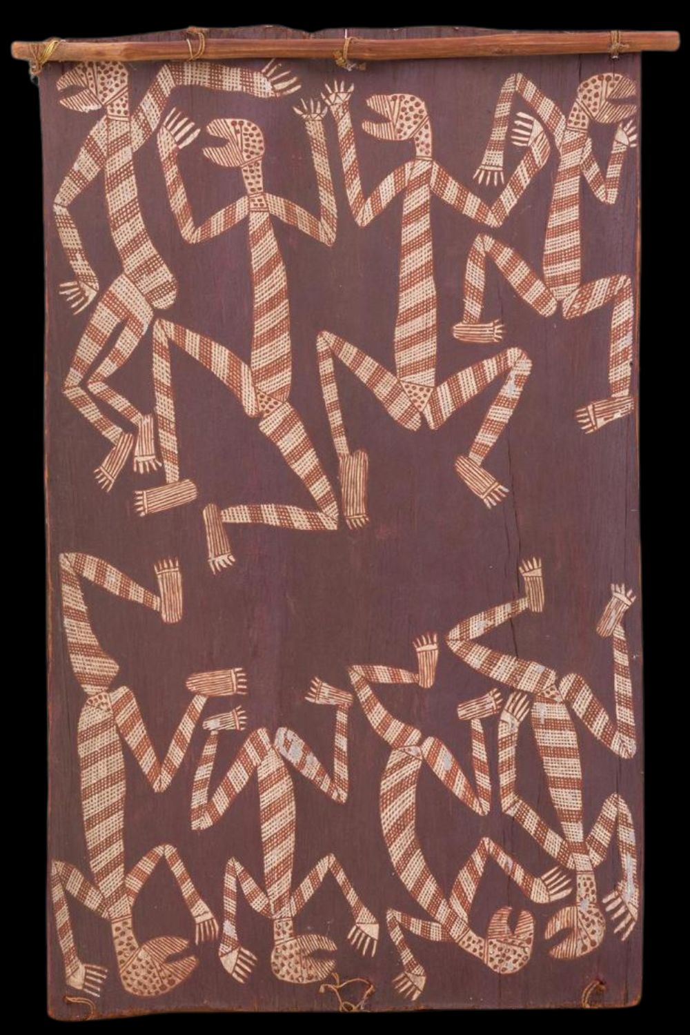 David Milaybuma bark painting depicting dancing Mimih spirits in natural ochres on eucalyptus bark, Western Arnhem Land.