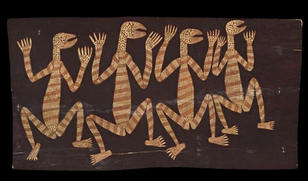 David Milaybuma bark painting depicting four dancing Mimih spirits in natural ochres on eucalyptus bark, Western Arnhem Land.