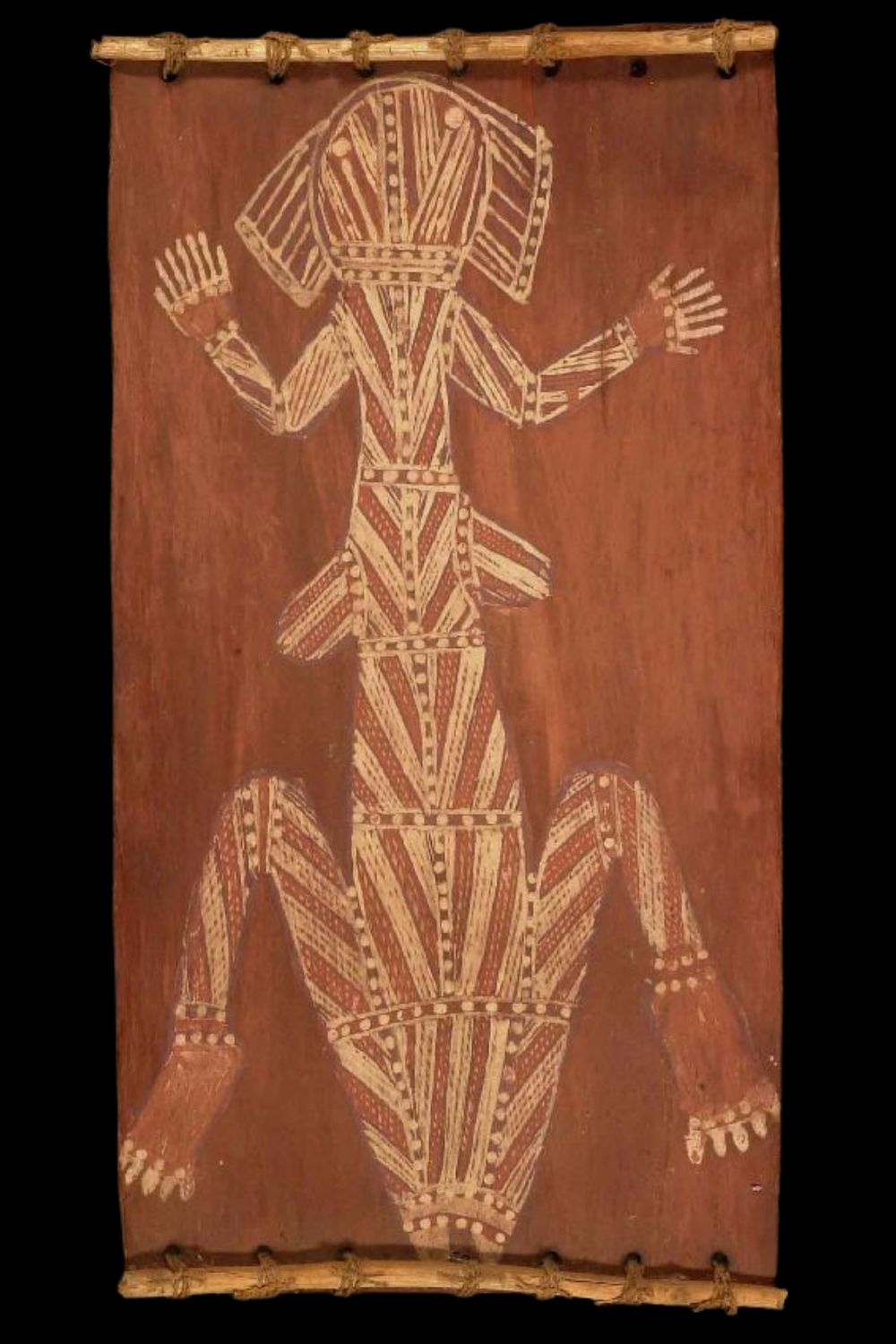 Jackie Madagarlgarl Aboriginal bark painting depicting an ancestral spirit figure in traditional Gunbalanya style with natural ochre pigments.