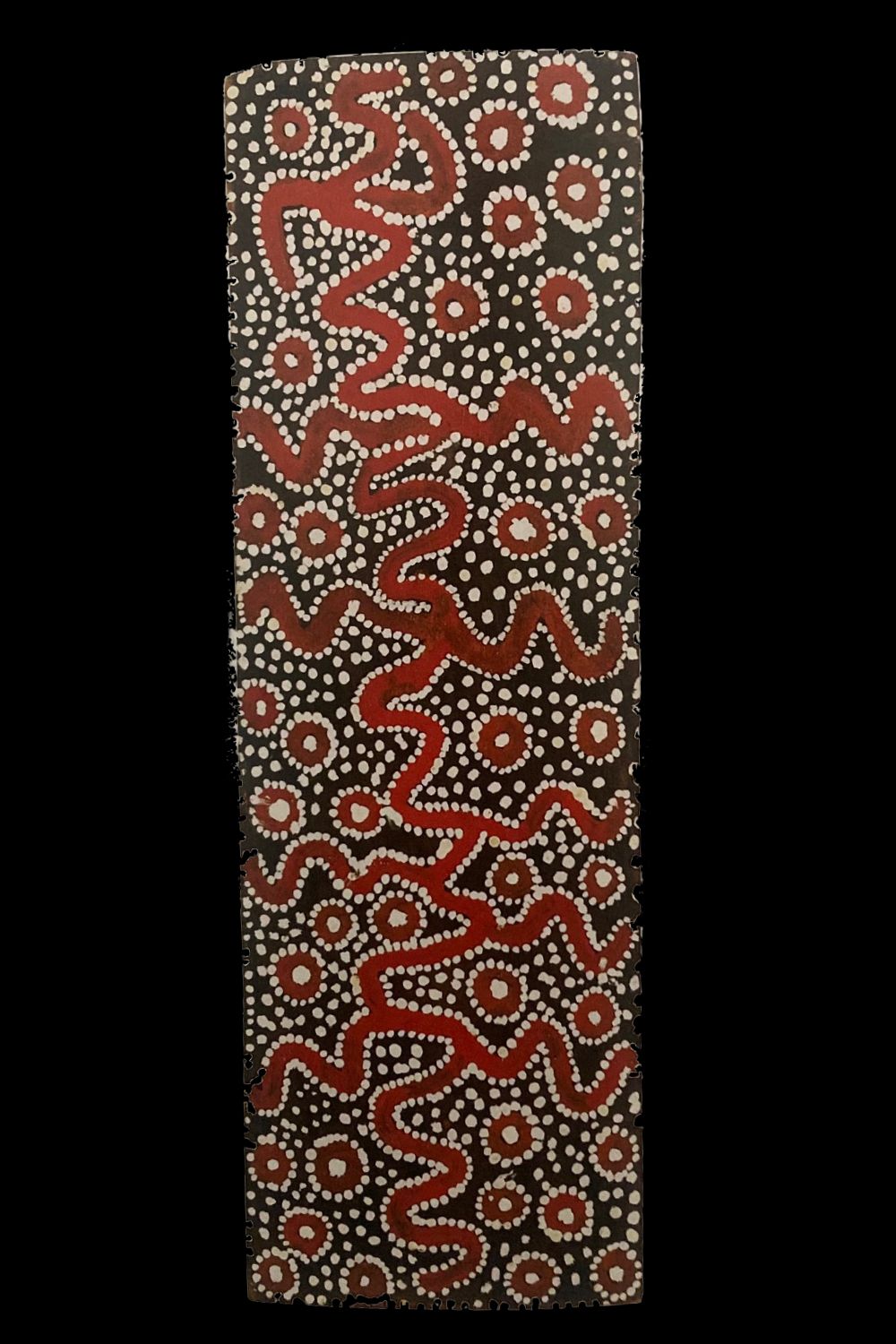 Early Papunya Board by Kingsley Tjungurrayi depicting Lightning and Rain Dreaming with flowing red lines, concentric circles and white dot work.