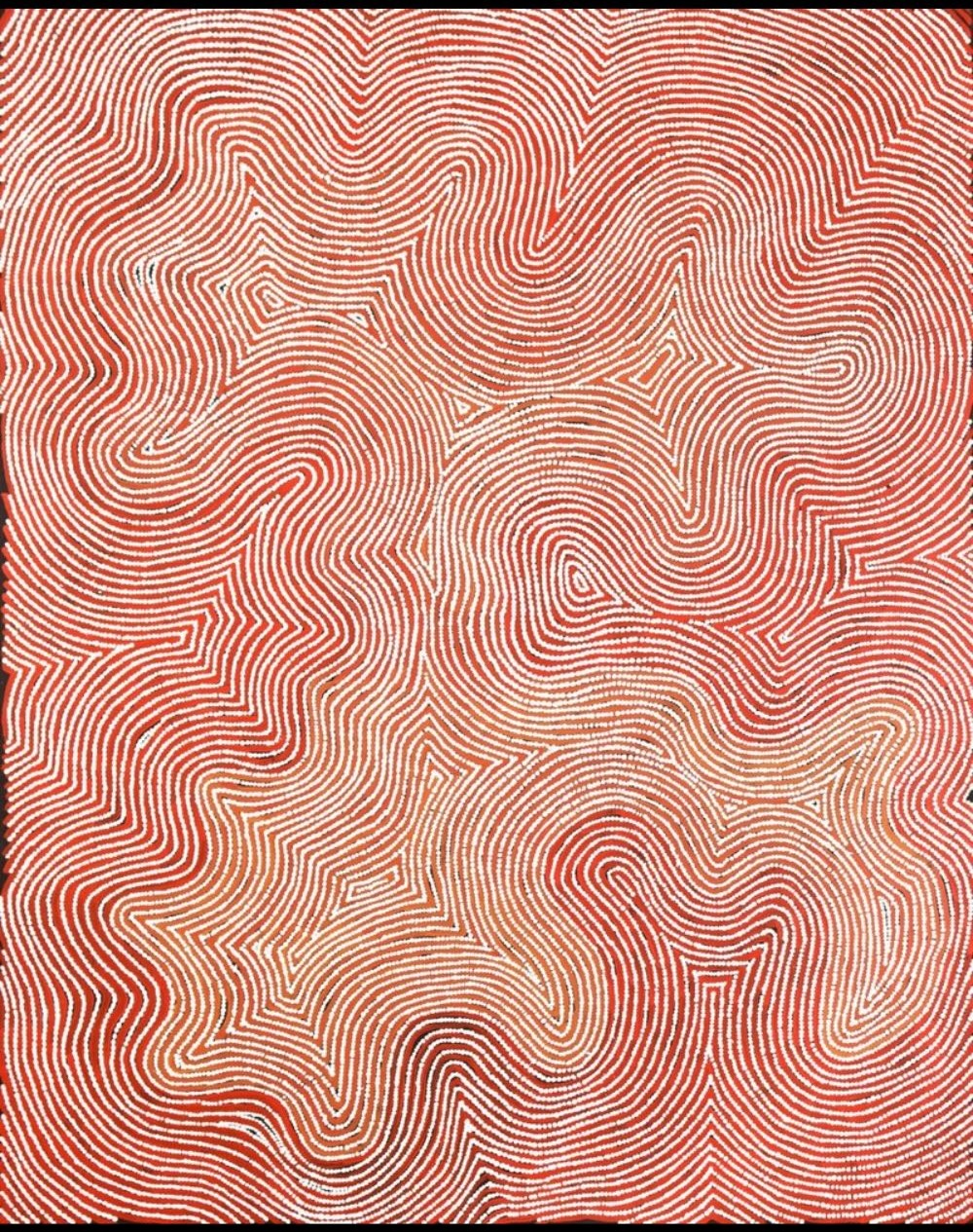 Abstract Aboriginal painting by Warlimpirrnga Tjapaltjarri featuring flowing red and white parallel lines that weave across the canvas to form interconnected pathways, curves and geometric motifs inspired by Wilkinkarra (Lake Mackay) and the Tingari ancestral journeys.