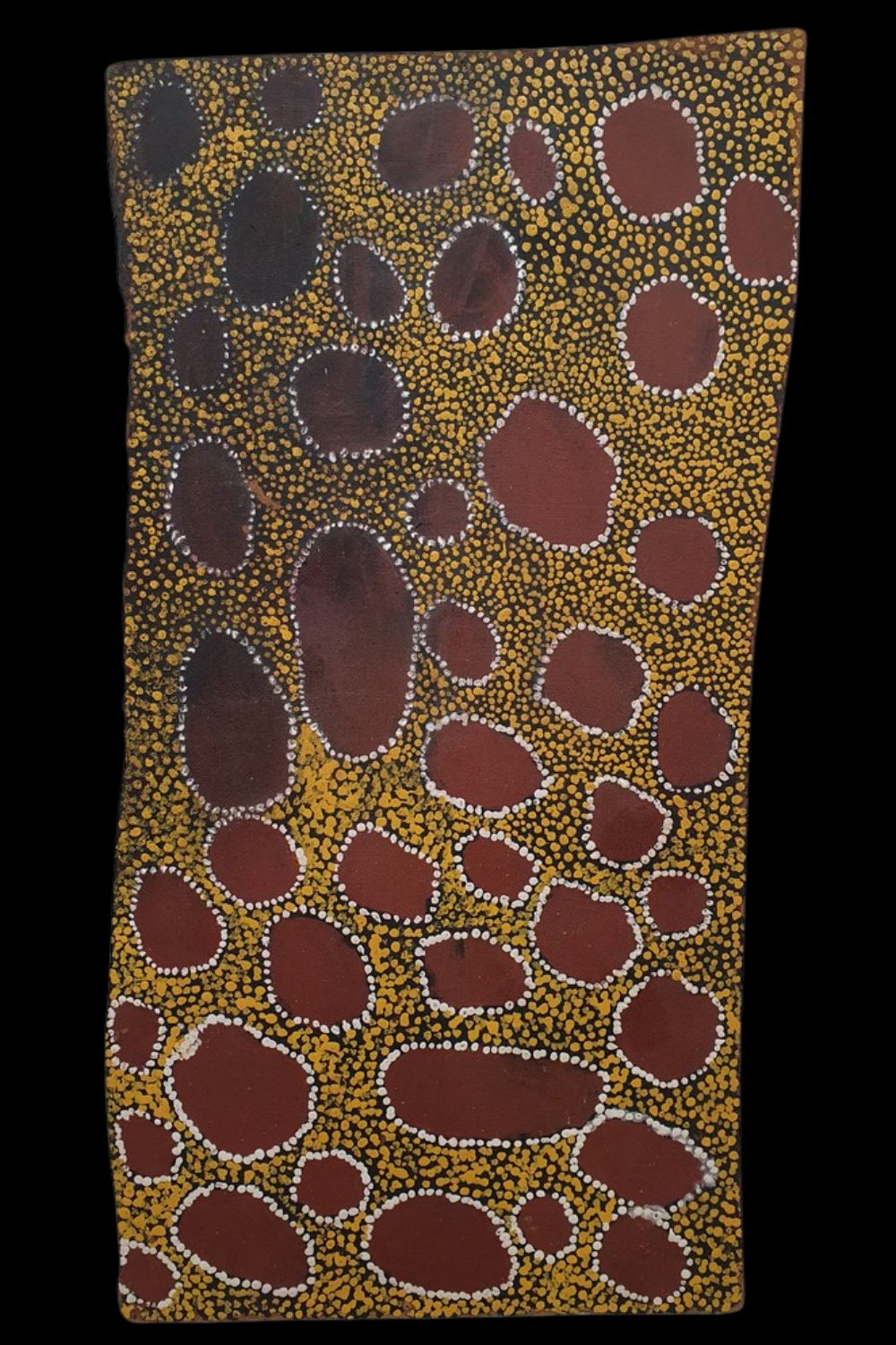 Untitled painting by Old Tutuma Tjapangati, after 1977, depicting an abstract arrangement of rockholes or soakages outlined in white against a dense ochre dotted background.